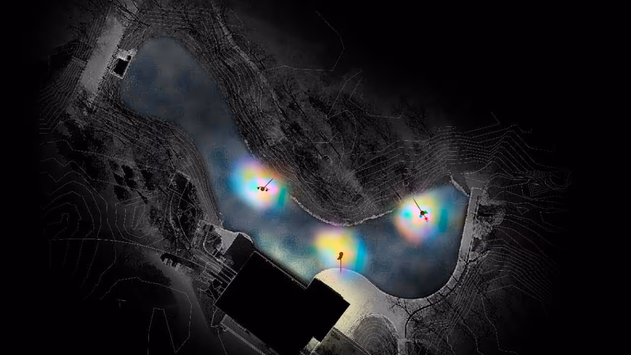 Dark plan of the duck pond with contour lines and three glowing multicoloured halos marking proposed light installations, next to a black building footprint.